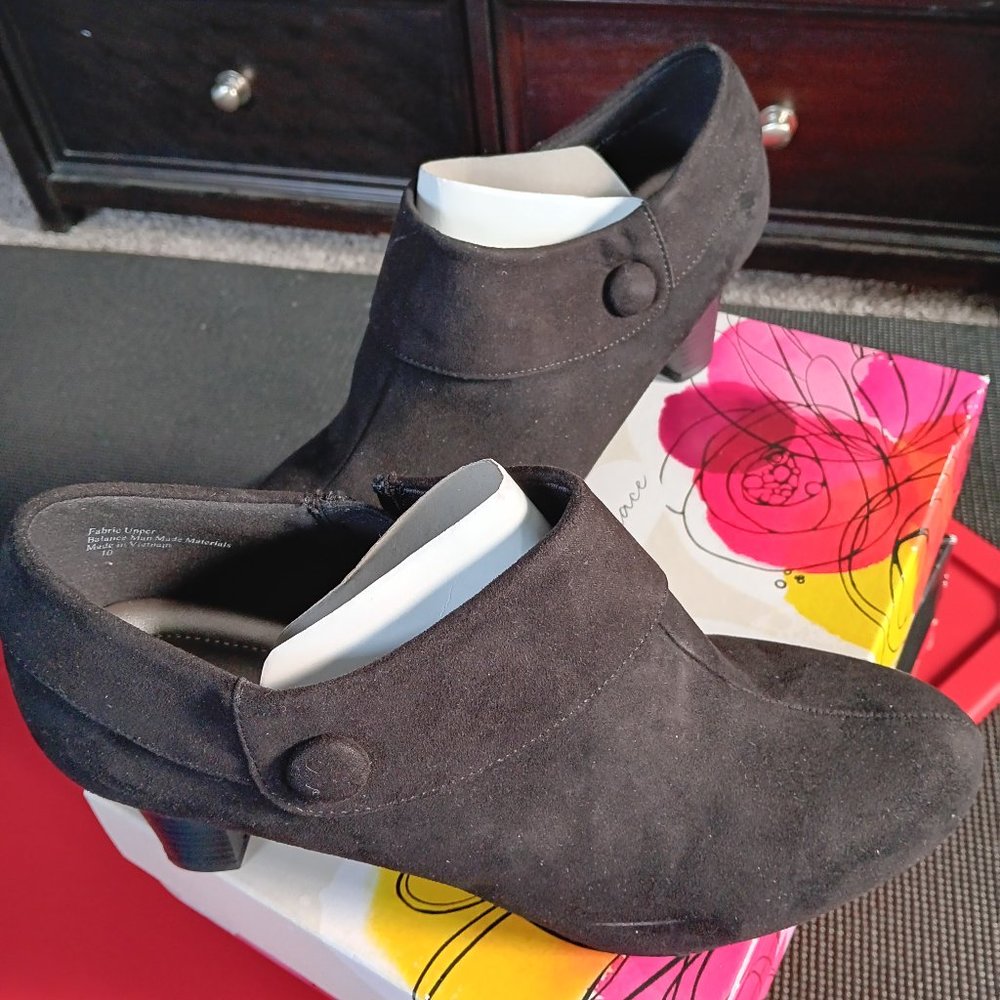 Black ankle Bootie with button accent